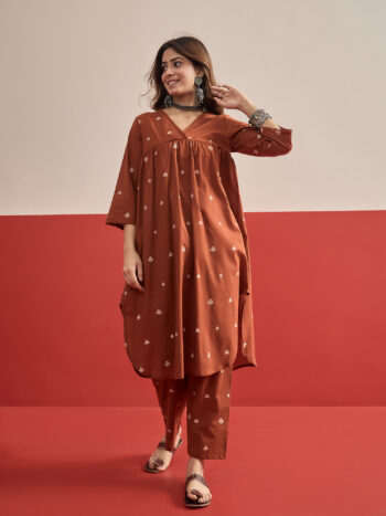 RUST CARDS PRINT FLARED KURTA PANT SET