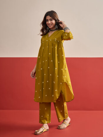 MUSTARD CARDS PRINT FLARED KURTA PANT SET